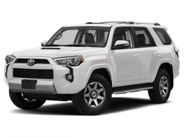 A white Toyota 4 Runner